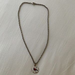 Silver color chain necklace with bird pendant